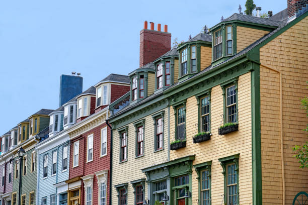 Row of colorful Victorian clapboard houses stock photo