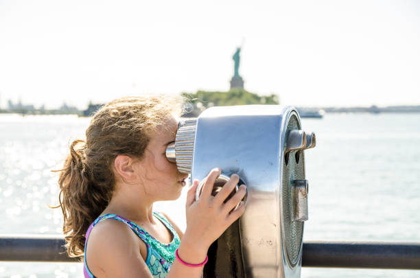 istock Kid looking at Manhattan Island 1170417590