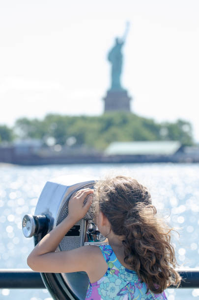 istock Kid looking at Manhattan Island 1170418428