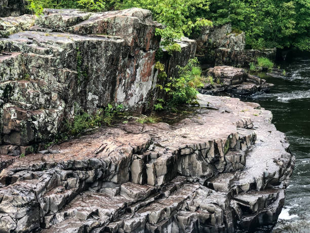 istock Rock layers by river in Wisconsin county park 1170419935