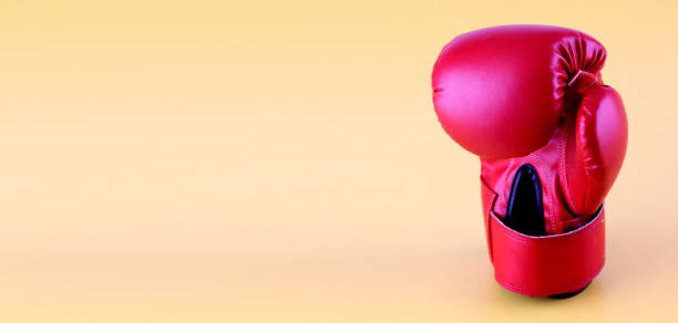 istock Boxing gloves in red on a yellow background 1170422019