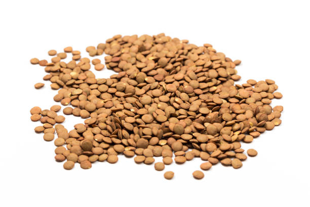 istock Pile lentil isolated on white background. Top view. 1170425081