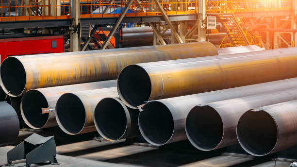 istock Black steel pipes in warehouse 1170425139