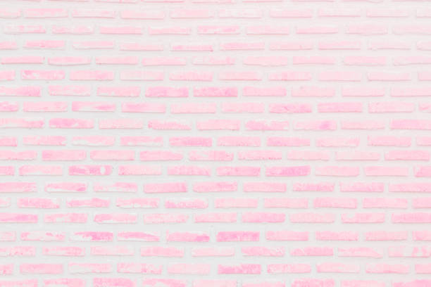 istock Abstract Pastel Pink and White brick wall texture background pre wedding. Brickwork or stonework lovely flooring interior rock old pattern clean concrete grid uneven bricks. 1170425223