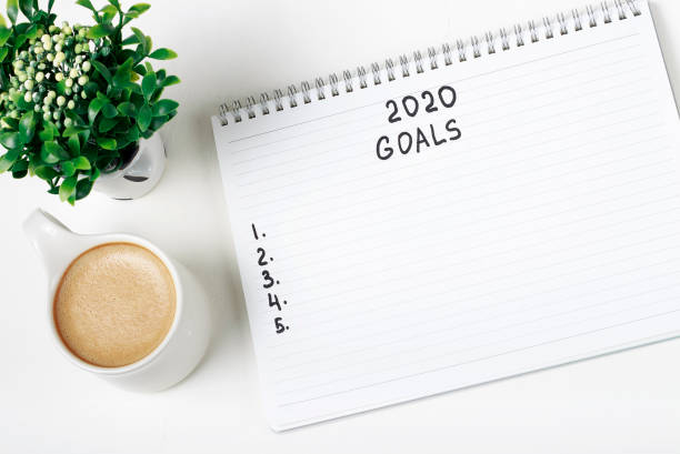 istock Inscription Goals 2020 in a notebook, close-up, concept of planning, setting purpose 1170426279