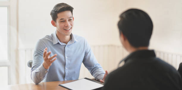istock Professional businessman explaining his idea  to his team member 1170426395