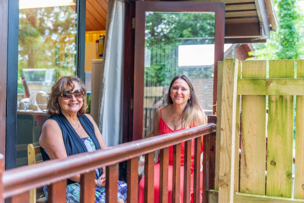istock Mature and senior women on open balcony 1170426805