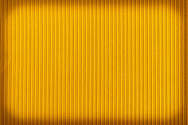 Decorative background yellow color, striped texture vignetting gradient. Wallpaper Art. Design