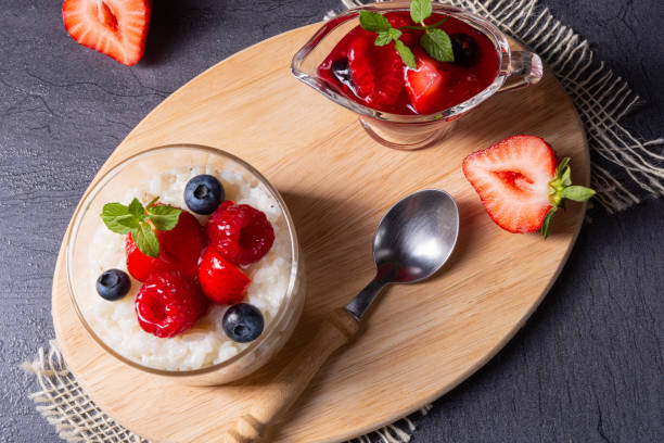 istock delicious milk rice with different berries and red fruit jelly 1170432840
