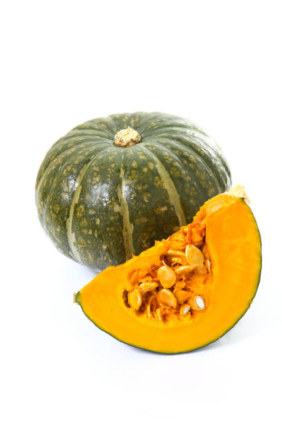 japanese pumpkin kabocha, whole and sliced japanese pumpkin kabocha, whole and sliced kabocha stock pictures, royalty-free photos & images