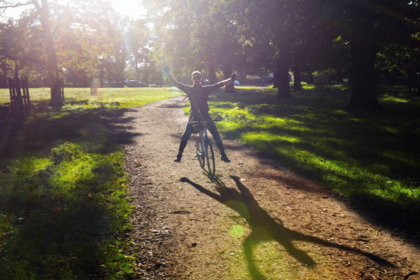 istock Young man cycling in Richmond Park, London 1170435152