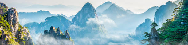 Landscape of Mount Huangshan Landscape of Mount Huangshan (Yellow Mountains). UNESCO World Heritage Site. Located in Huangshan, Anhui, China. anhui province stock pictures, royalty-free photos & images