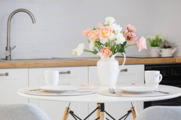 istock served table with  bouquet of roses 1170439504