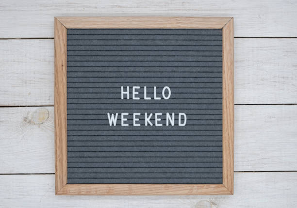 istock felt board with text in English hello weekend on a white wooden board background 1170445183