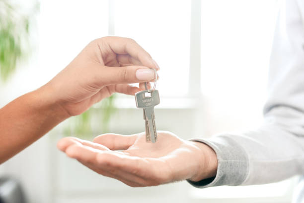 istock Passing flat key to tenant 1170447950