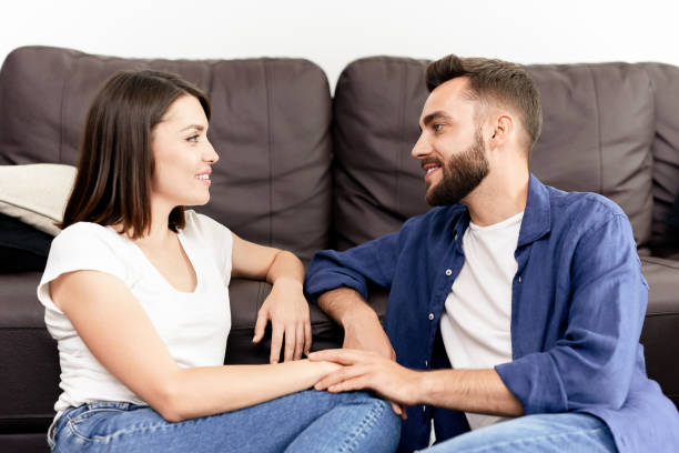 istock Couple chatting with each other at home 1170447999
