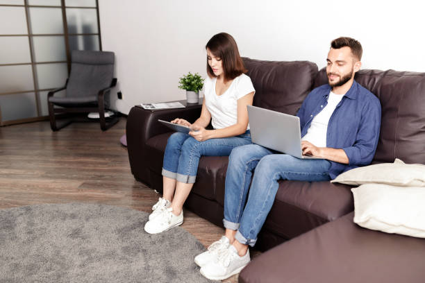 istock Busy with devices at home 1170448031