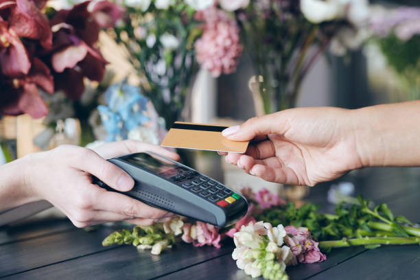 istock Paying wireless card for flowers 1170449814