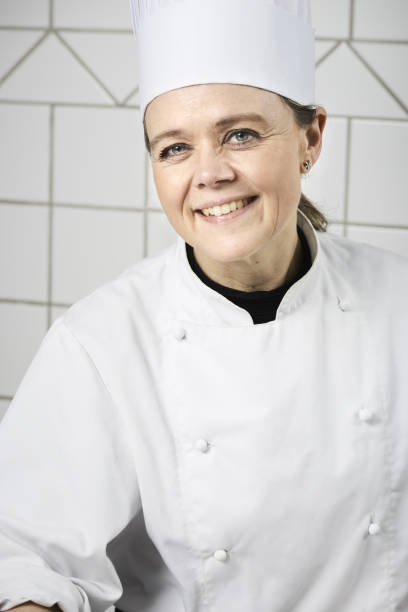istock confectioner making cakes and chocolate in her confectionery 1170451745