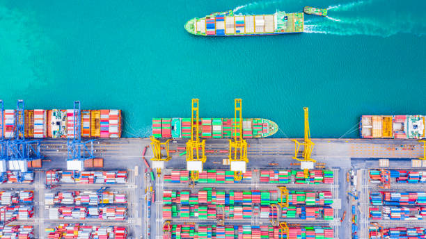 istock Top view of Deep water port with cargo ship and containers. It is an import and export cargo port where is a part of shipping dock and export products worldwide 1170452606