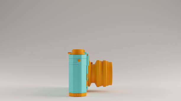 istock Gulf Blue Turquoise and Orange Vintage Camera with Adjustable Lens 1170455265