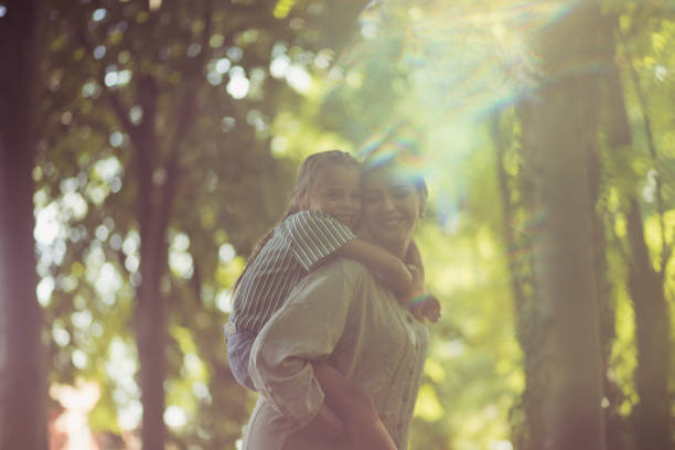 Mom, I love you. Mother daughter outdoor.