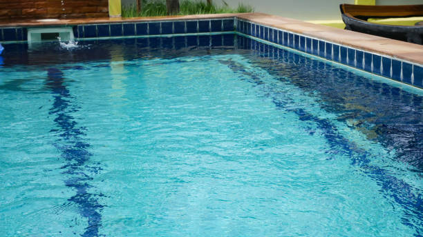 istock Close up Blue water in swim pool. 1170462128