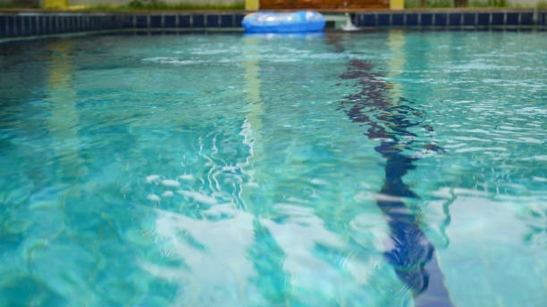 istock Close up Blue water in swim pool. 1170462140