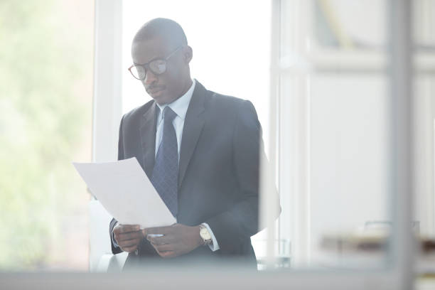 istock Manager examining the business contract 1170463052