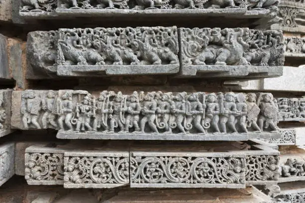 Episode from Ramayana. Rama, Sita and Laxmana returning from Lanka. Kedareshwara temple, Halebidu, Karnataka, india.