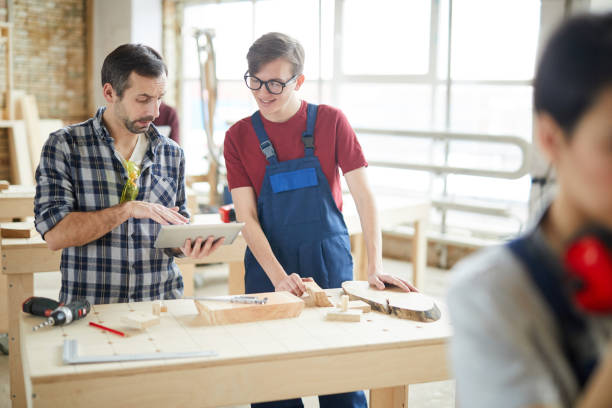 istock Modern Carpenters Working in Shop 1170466348