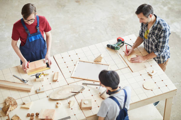 istock Team of Carpenters Working Background 1170466422