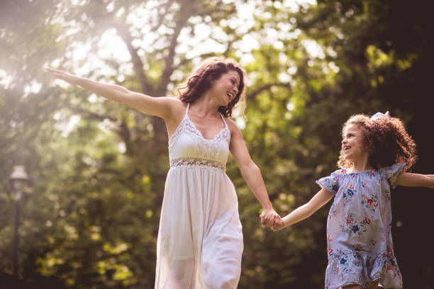 istock Enjoying a sunlit hike through the woods. 1170467455