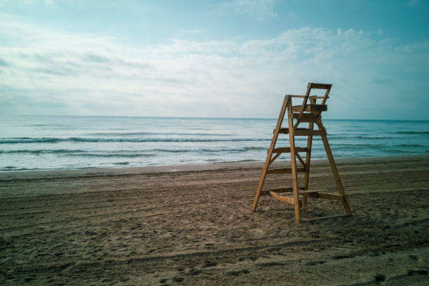 istock Lifeguard chair on the beach 1170471782