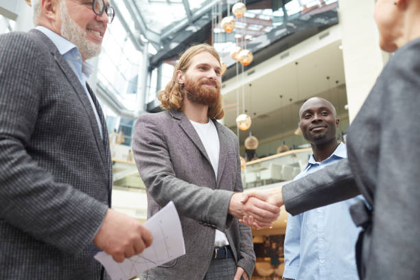 istock Business People Meeting in Lobby 1170476570