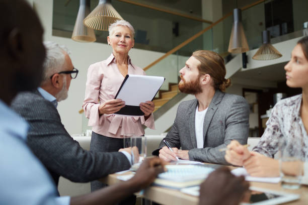 istock Female Boss Leading Meeting 1170476747