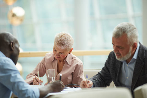 istock Business People Writing in Meeting 1170476770