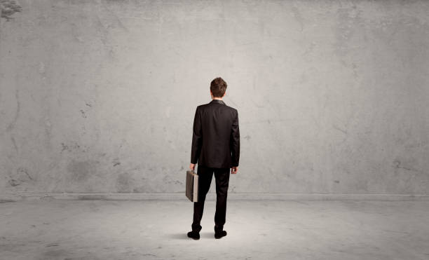 istock Businessman lost in empty urban space 1170479470
