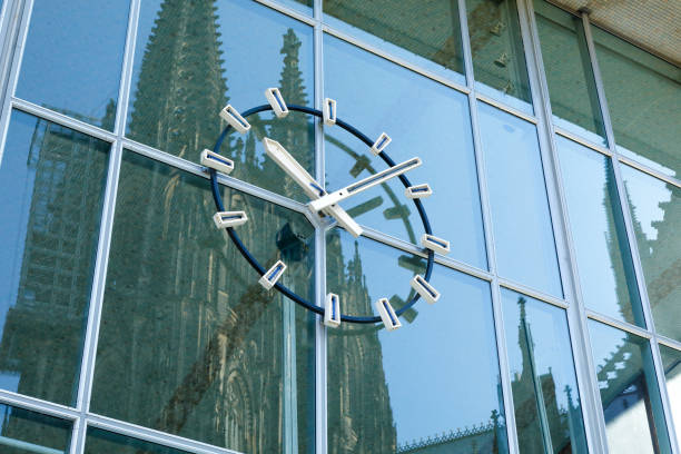 istock Station Clock with reflecting Cologne Cathedral Towers 1170481017