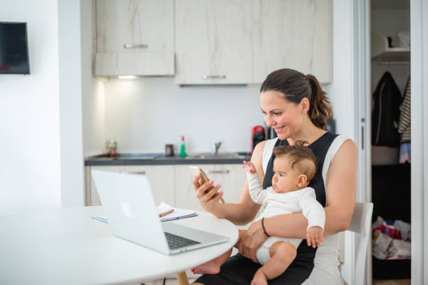 istock Young mother, working from home 1170481100