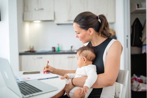 istock Young mother, working from home 1170481115