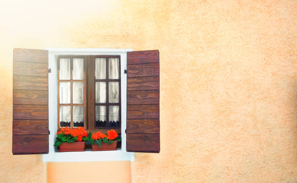 Window and flowers of a vintage Italian house