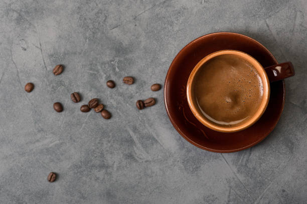 istock Cup of coffee on rustic background. Top view. 1170482227