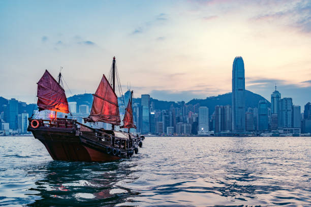 istock Retro small ship in Hong Kong harbour. 1170482415