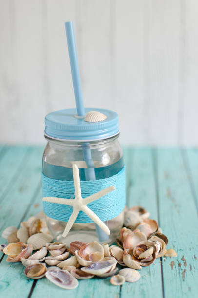 istock Drinking water in a jar with a straw 1170482539