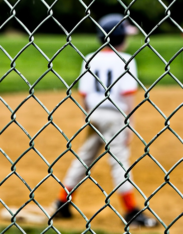 Playing in a youth baseball game