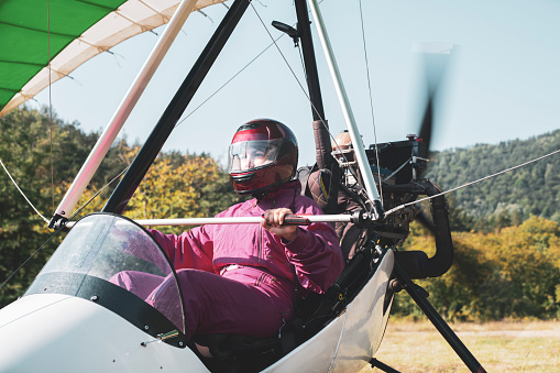 The pilot woman is preparing to take off