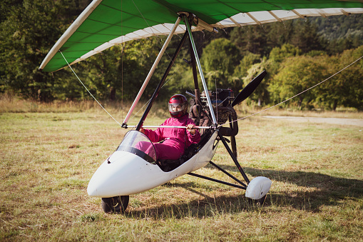 The pilot woman is preparing to take off