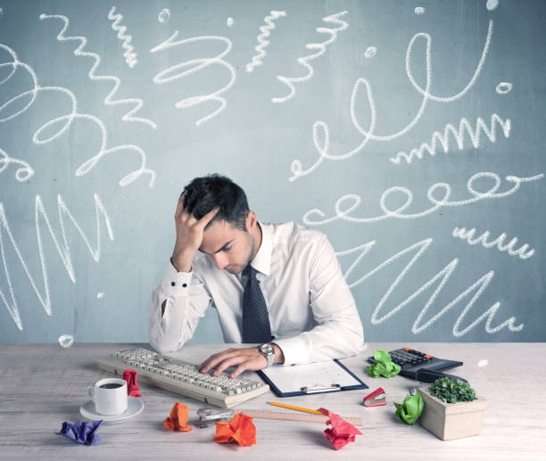 istock Tired office worker with drawn messy lines 1170493895