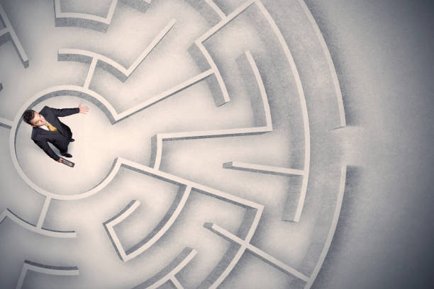istock Business man trapped in a circular maze 1170493961